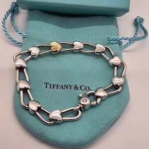 Tiffany & Co. Silver Bracelet with Gold Heart Accent